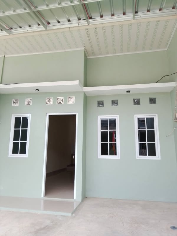 Rumah di perum BCA blok F6 no. 1
