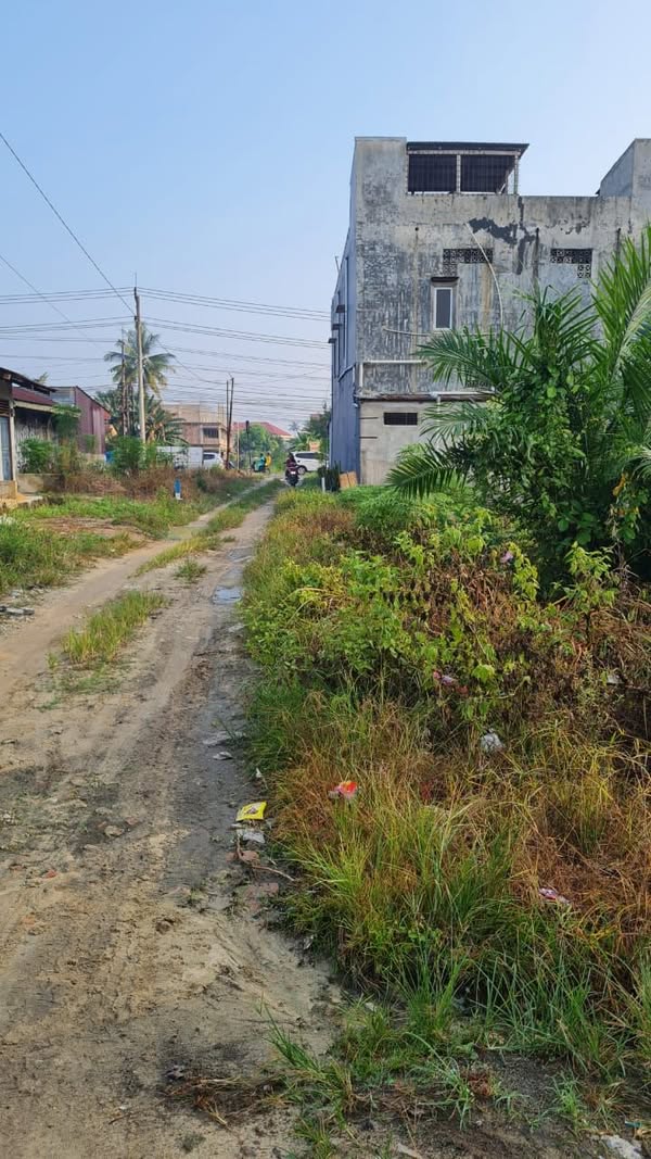 Tanah belakang ruko Jalan lintas pasir putih pandau jaya